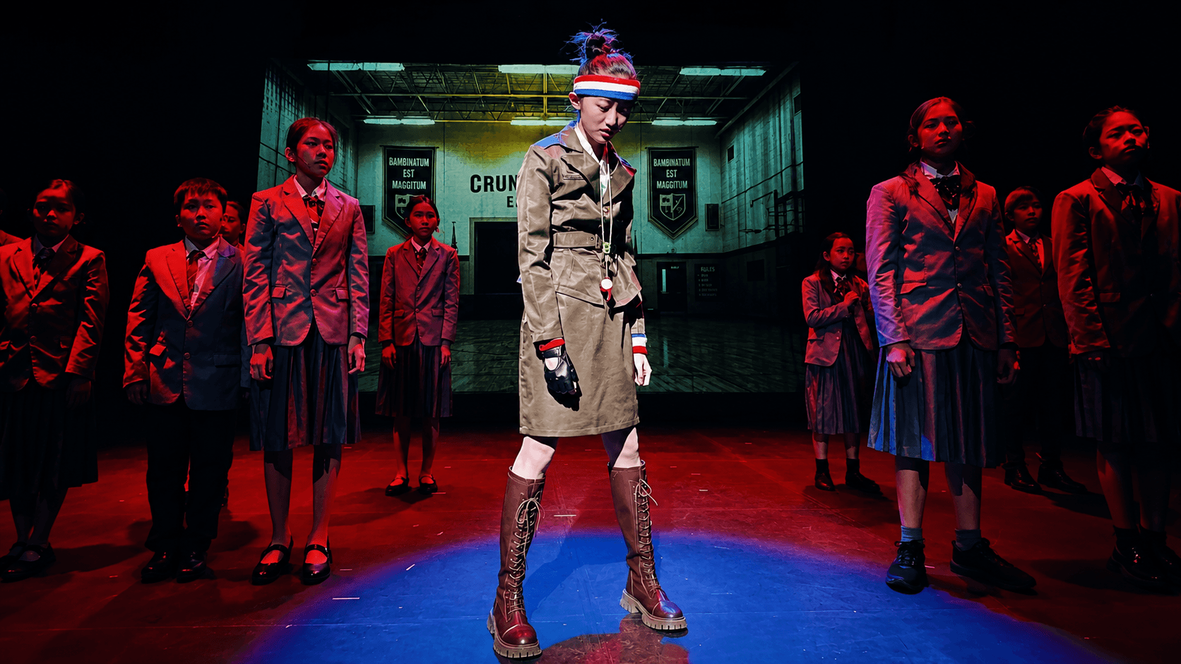Young performers in costume onstage during TADA's production of Camp Crunchem
